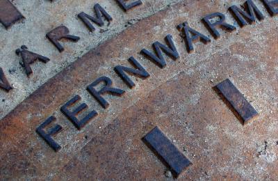 Close up of metal container with embossed lettering