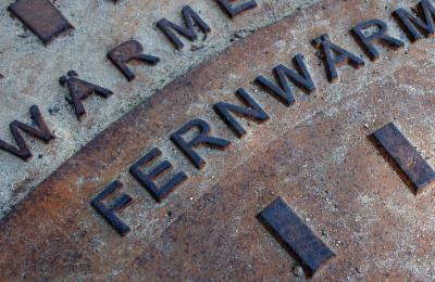 Close up of metal container with embossed lettering
