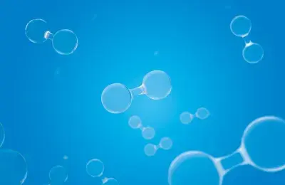 Illustration of hydrogen molecules floating against a bright blue background, symbolizing green hydrogen production.