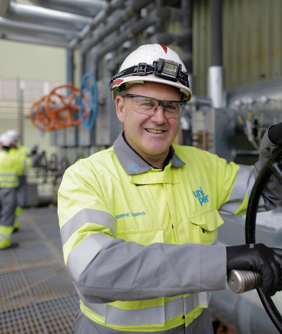 Connah's Quay Man turning big pipe wheel