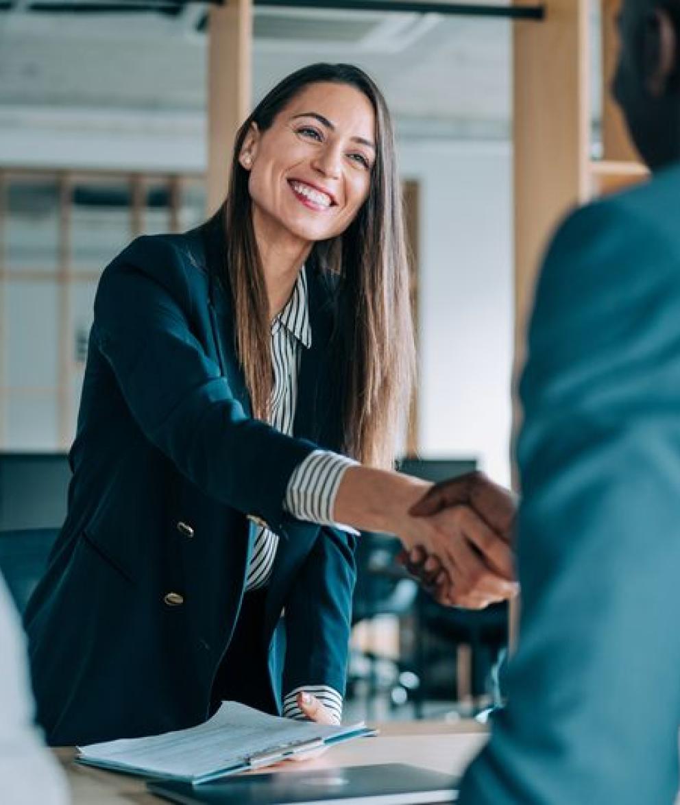Employees shaking hands