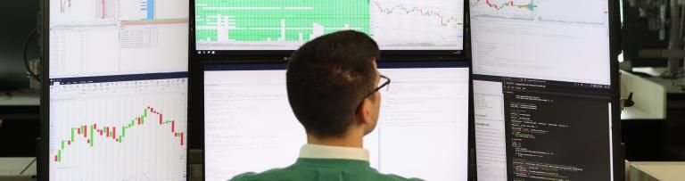 Uniper trading employee looking at screens of trading data