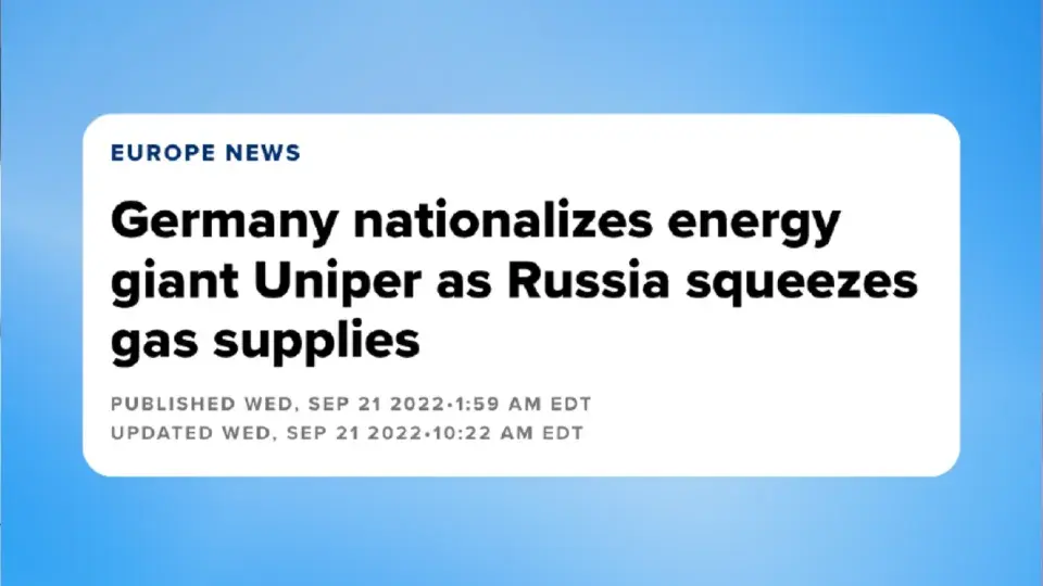 Alt text for this image could be: "The Uniper logo displayed on a sign outside a modern building, with a combination of glass and dark metal elements.