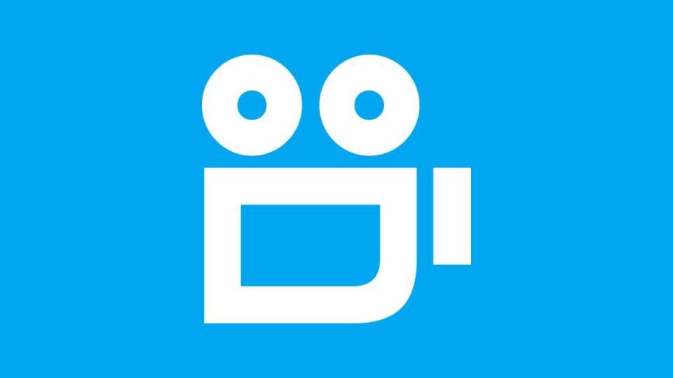 White icon of a camera on a bright blue background, symbolizing video or media production.