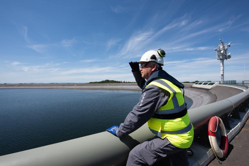 Engineer observing a hydro facility
