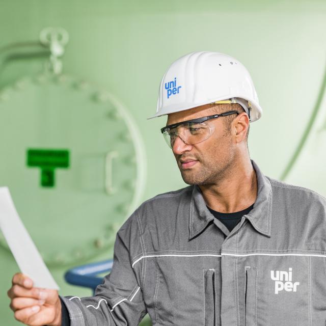 Engineer observing ticket at coal fired power station MPP3 at Maasvlakte close to Rotterdam